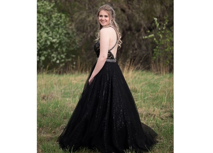 Busenius was inspired to help with the photography project after seeing her daughter, Olivia Busenius (pictured), upset about missing her prom.