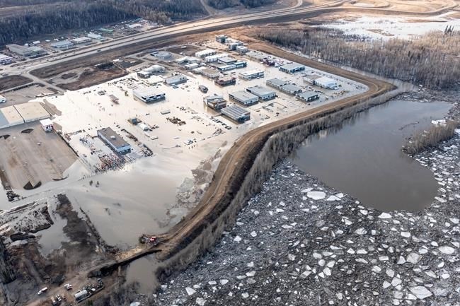 The flooded Taiga Nova Eco-Industrial Park alongside the Athabasca River at the north end of Fort McMurray is shown on Tuesday, April 28, 2020. Officials in Fort McMurray are keeping a close eye on river levels after a 25-kilometre ice jam caused major flooding and forced about 12,000 people from their homes. 