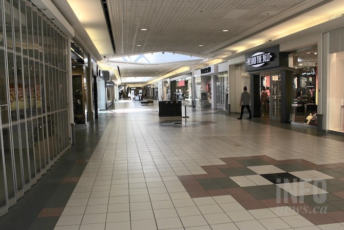 Inside Orchard Park mall about one quarter of the shops are now open but crowds were pretty sparse at opening time, Tuesday, May 19, 2020.