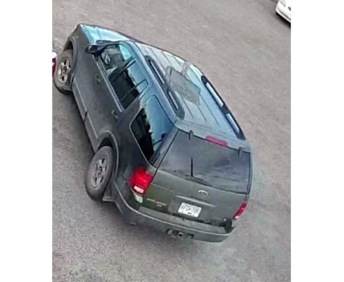 One of the vehicles of interest, a 2003 green Ford Explorer.