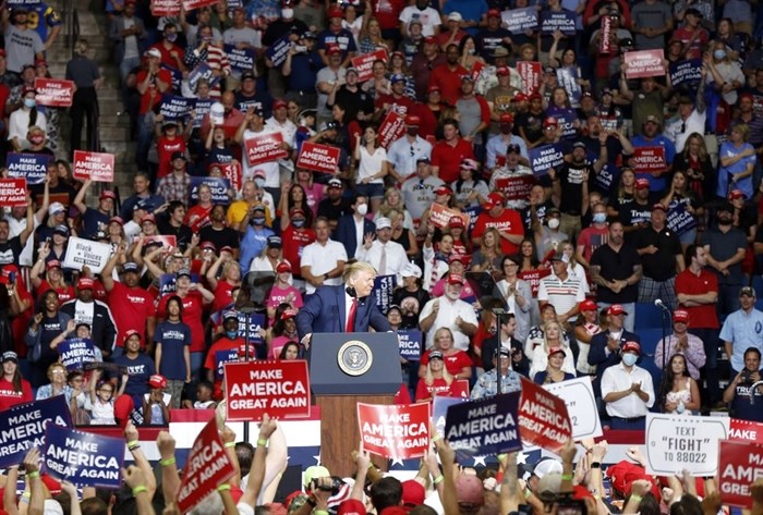 President Donald Trump, front center, speaks at BOK Center during his rally in Tulsa, Okla., Saturday, June 20, 2020. 