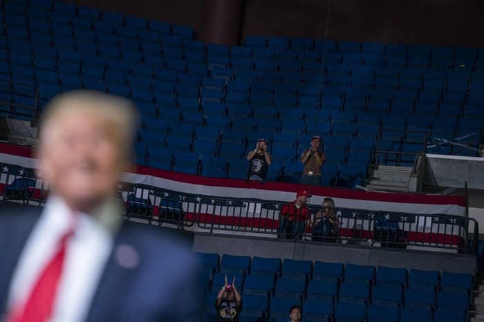 President Donald Trump supporters cheer as Trump speaks during a campaign rally at the BOK Center, Saturday, June 20, 2020, in Tulsa, Okla. 