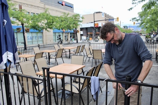 FILE PHOTO - Louis Drummond puts the final touches on his Fernando's Pub patio.