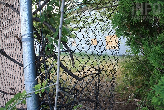 Business owners adjacent the Compass House facility say there are numerous gaps in the chain link fence surrounding the property as well as a general lack of security. 