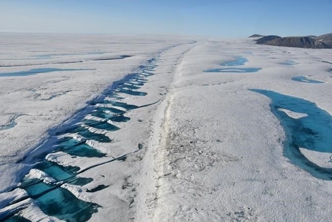 A rift in the Milne Ice Shelf on Ellesmere Island is shown in a 2019 handout photo. The Canadian Ice Service says a huge chunk has broken off Canada's last fully intact ice shelf on the northwest coast of Nunavut's Ellesmere Island. The Milne Ice Shelf is 40 per cent smaller after the split that began late last month.