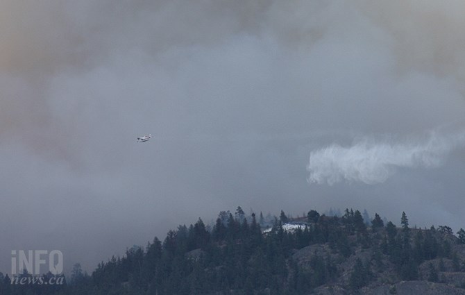 Amphibious aircraft work the Mount Christie wildfire.