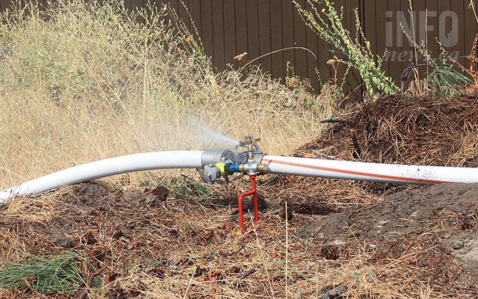 A sprinkler unit used as part of the structural protection process in wildfire firefighting.