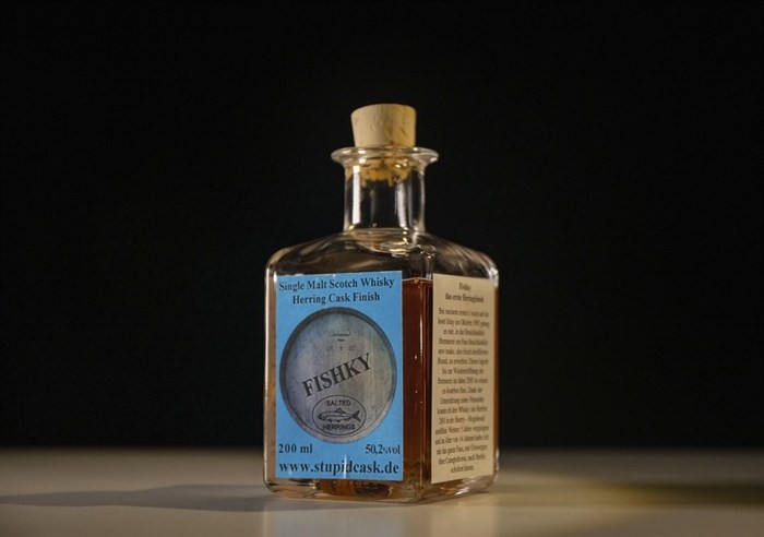 In this photo dated Tuesday, Aug. 25, 2020, made available by Disgusting Food Museum, showing a bottle of Fishky, whisky matured in a herring cask, on display at the Disgusting Food Museum in Malmo, Sweden, that will open Saturday Sept. 5.