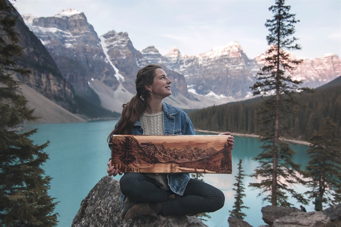 Kelowna-based artist Samm Moore at Moraine Lake.