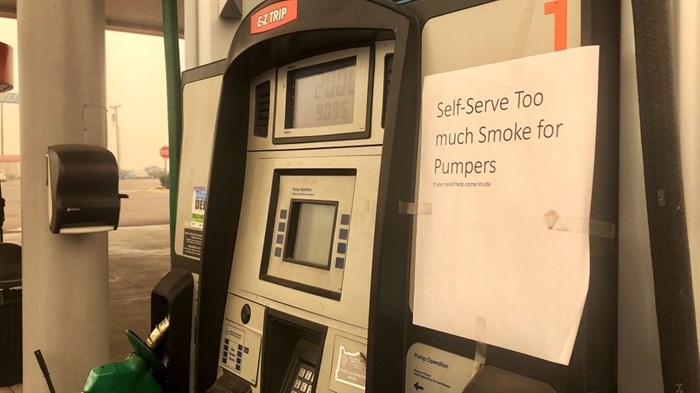 A sign on a pump at a gas station on Interstate 5 in Marion County, Oregon, announces that it is closed on Friday, Sept. 11, 2020.