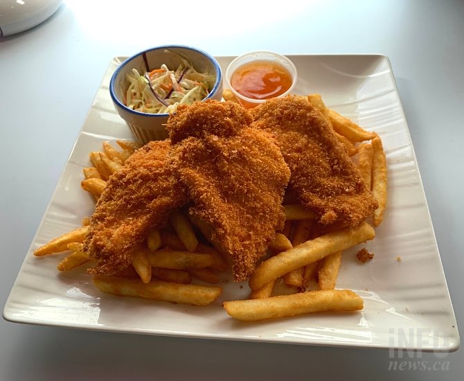 Homemade chicken strips with fries, coleslaw and plum sauce from Jay
