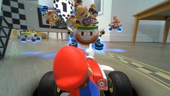 A screenshot from the video game Mario Kart is shown in a handout.