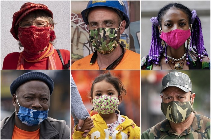 In this combination of photos, New Yorkers pose for photos during the coronavirus outbreak in New York.