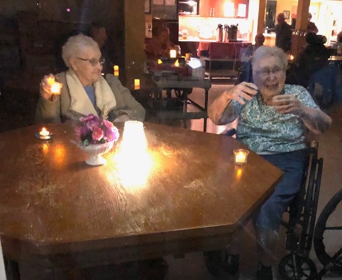 Twenty family members brought candles and came to see the seniors through the windows from outside Pine Grove Care Centre. 