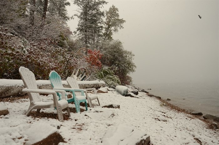 Early season snowfall can be seen in Vernon on the shore of Okanagan Lake, Friday, Oct. 23, 2020.