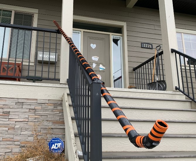 Kyle McKay made a Halloween candy slide using drain pipe.