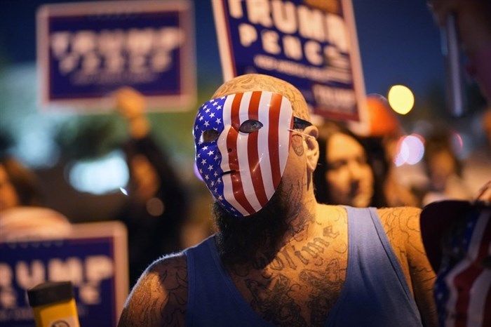 Supporters of President Donald Trump protest the Nevada vote in front of the Clark County Election Department, Wednesday, Nov. 4, 2020, in Las Vegas.