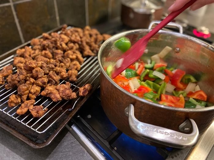 The crispy pork is set aside while you prepare the sauce ingredients.