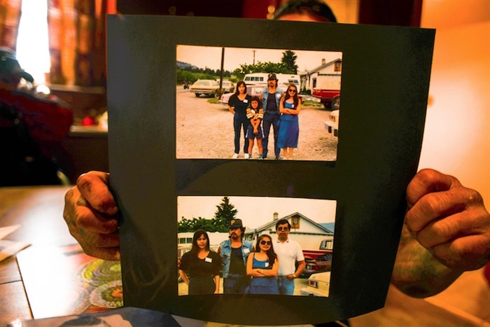 Bob Frezie, youngest son of Dianne holds up photos of his loving mother. Dianne is pictured to the far left and her brother stands to her right, her brother committed suicide shortly after her remains were discovered.