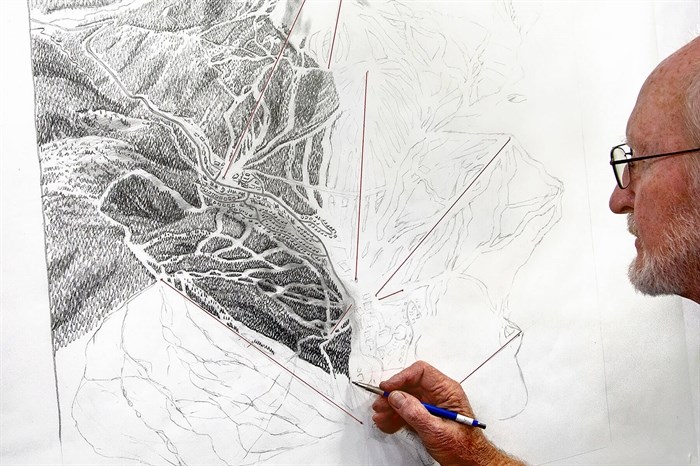 James Niehues working on the sketch for the new map.