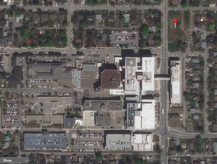 The red dot in the top right corner shows the location of the new land bought by Interior Health next to Kelowna General Hospital. Below that is the Dr. Walter Anderson building. Below that and to the right of the alleyway is where the new Speer Street staff parking lot now sits. Towards the bottom left is the space between the two existing parkades that Interior Health rejected as a site for a new staff parkade.