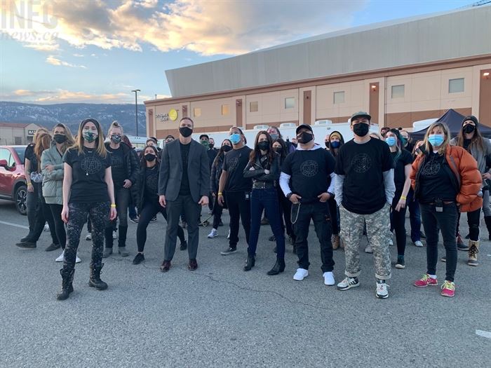 Reel One Entertainment crews pose for a photo behind Prospera Place wearing Black Lives Matter T-shirts, Tuesday, March 9, 2019. The crew was shooting a Hallmark Christmas movie.