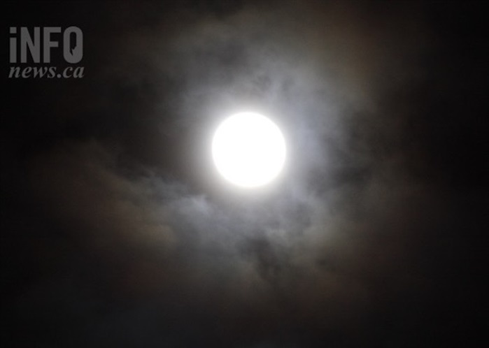 Viewers of this month's controversial supermoon may have to wait for a break in the clouds for viewing opportunities this weekend.