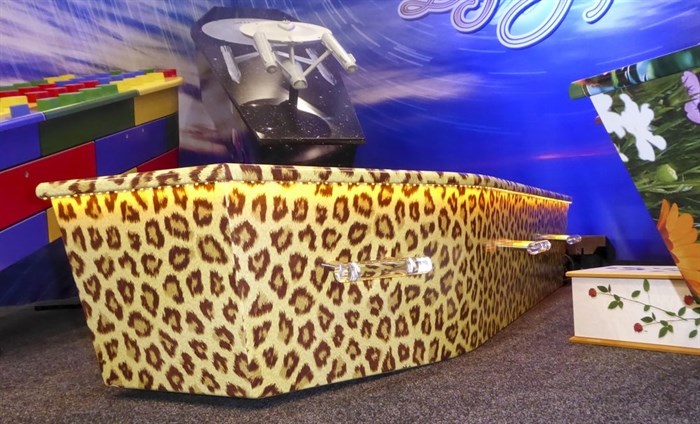 This photo provided by Ross Hall, shows a leopard skinned designed casket in Auckland, New Zealand on March 17, 2016.