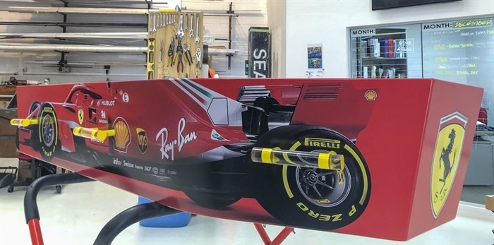This photo provided by Ross Hall a casket in the design of a Ferrari F1 car in in Auckland, New Zealand on Dec 10, 2018.