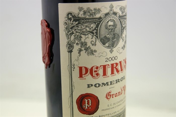 A bottle of Petrus red wine that spent a year orbiting the world in the International Space Station is pictured in Paris Monday, May 3, 2021. The bottle will be auctioned at Christie's auction house. 