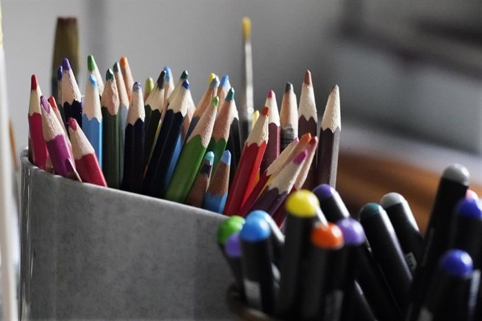 Colored pencils, sharpened and at the ready, rest in a container on the desk of artist Robert Seaman in his room at an assisted living facility Monday, May 10, 2021, in Westmoreland, N.H.