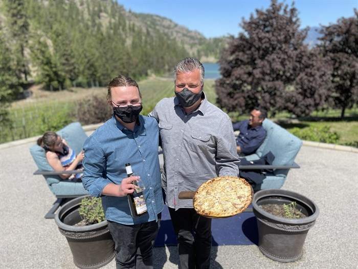PIzza & wine are served by the Bibby family at their winery in Okanagan Falls. Winemaker Dakota Bibby with dad Daniel Bibby.