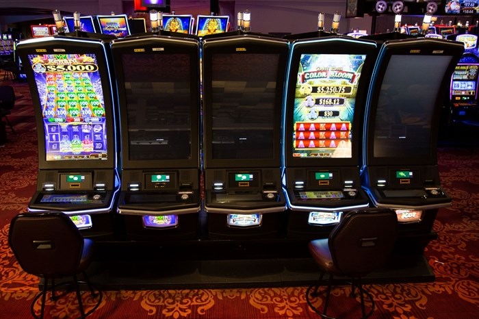 Seating at slot machines will have to be safely distanced when casinos re-open in July as illustrated in the photo submitted by the BC Lottery Corporation. Chances in Kelowna has already separated its machines to make sure patrons keep their distance from each other.