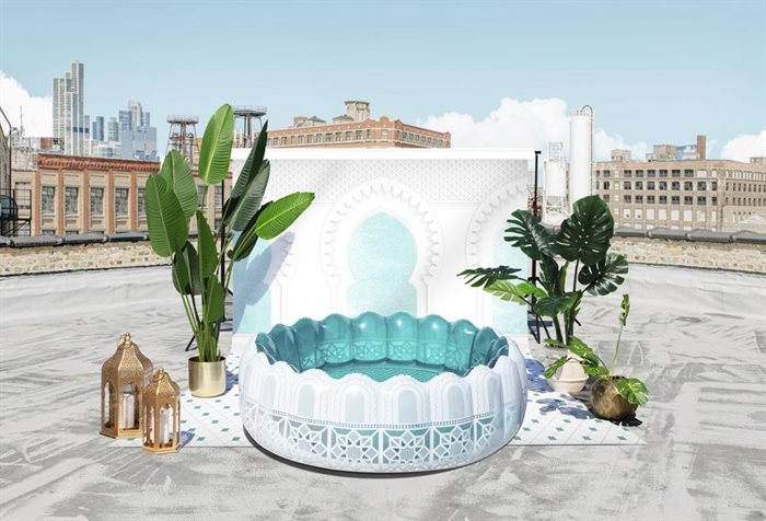 This image provided by Minnidip shows an inflatable pool. Minnidip makes inflatable "adult kiddie pools" that aim to transport you to some exotic travel destination. Patterns on the Marrakesh pool reference Moroccan architectural details, while the Amalfi is a nod to the blue, yellow and white tile of the Italian coast.