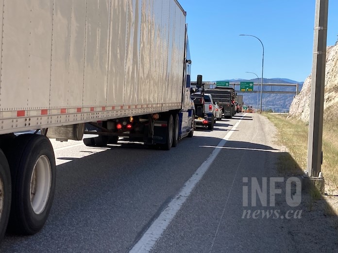 A fatal crash last night between a commercial transport and a logging truck on Highway 97C has backed up traffic all the way to the entrance to the highway between West Kelowna and Peachland, Thursday, June 17, 2021. 