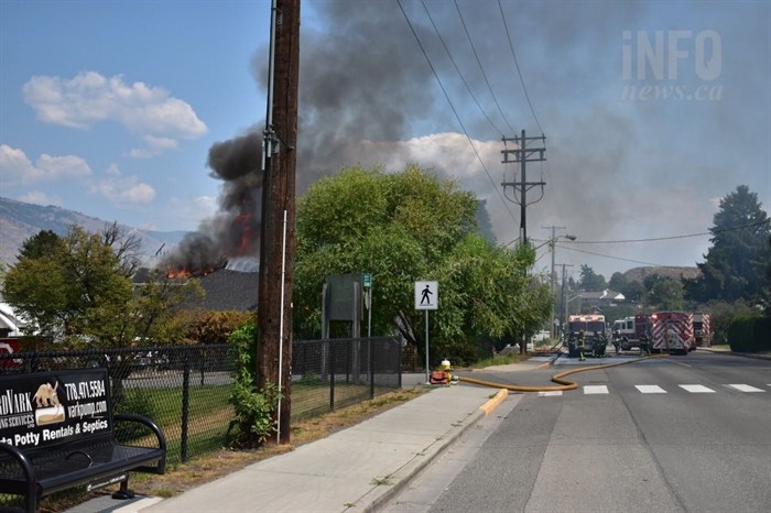 Kamloops firefighters are fighting a house fire at 1214 Columbia Street in the city's downtown, Friday, July 9, 2021.