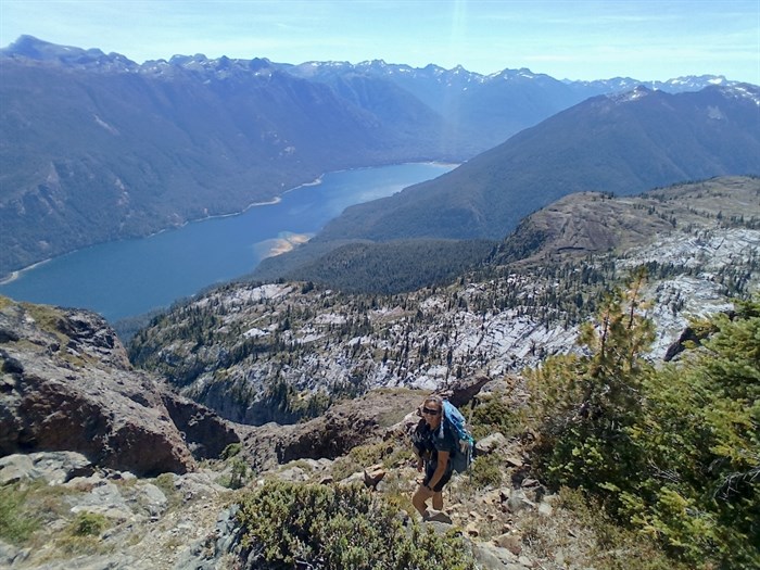 Chelsea Brager ascends a peak on Vancouver Island while searching for endangered Vancouver Island marmots.
