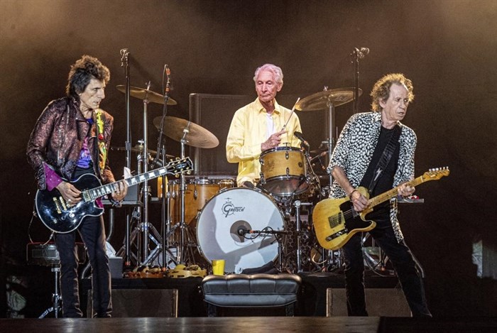 FILE - Ronnie Wood, from left, Charlie Watts and Keith Richards of The Rolling Stones perform on July 15, 2019, in New Orleans. Watts' publicist, Bernard Doherty, said Watts passed away peacefully in a London hospital surrounded by his family on Tuesday, Aug. 24, 2021. He was 80.