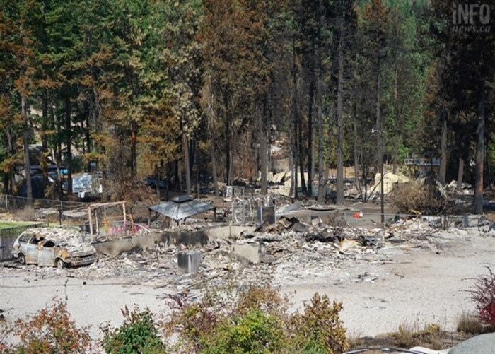 Some of the destruction in the Killiney Beach area of the White Rock Lake wildfire.
