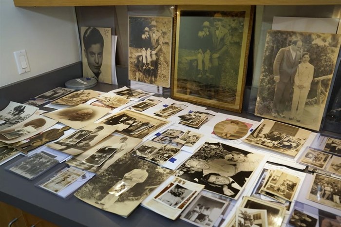 A collection of photographs from the estate of mob boss Al Capone is seen on display at Witherell's Auction House in Sacramento, Calif., Wednesday, Aug. 25, 2021. The photographs are among the 174 family heirlooms that will be up for sale at an Oct. 8 auction titled 