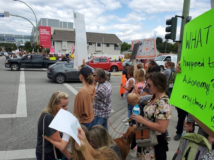 A COVID-19 vaccine passport protest outside of Kelowna General Hospital, Sept. 1, 2021.