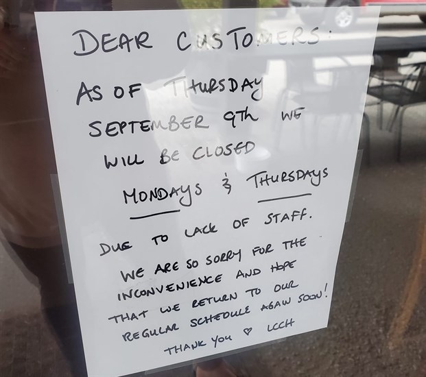 A letter on the door of Lake Country Coffee House.