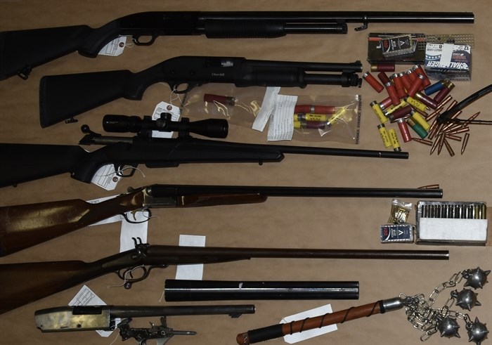 Some of the weapons seized by RCMP during a raid at a home in Kamloops, Oct. 7, 2021.