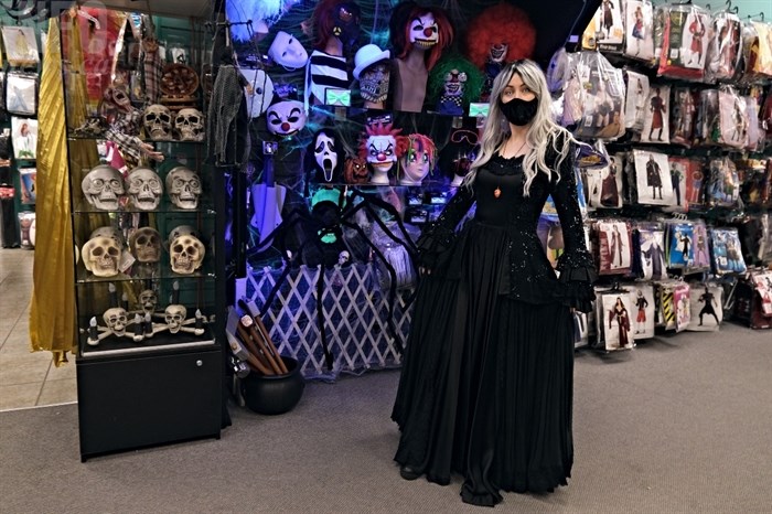 Calowna Costume employee Laura McKenzie showcases her Halloween outfit.