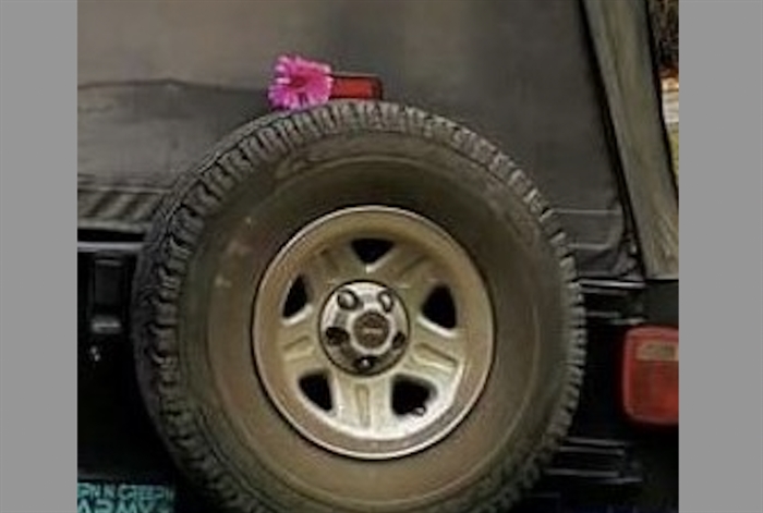 A pink flower that usually sits above the spare tire was no longer there when police recovered Shannon White's Jeep.
