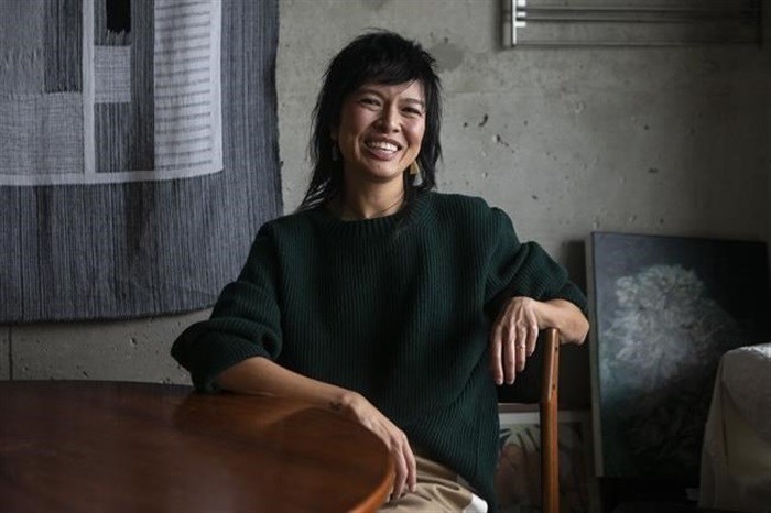 Partial Gallery's Tammy Yiu Coyne is photographed in Toronto, on Thursday November 4, 2021. When the COVID-19 pandemic sent droves of office workers home, it took little time for some to tire of staring at drab living rooms or spare bedrooms in need of a makeover.