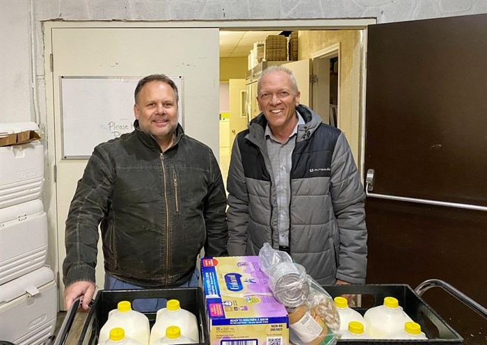 Danny Iosch and pastor Phil Johnson at the Osoyoos Food Bank.