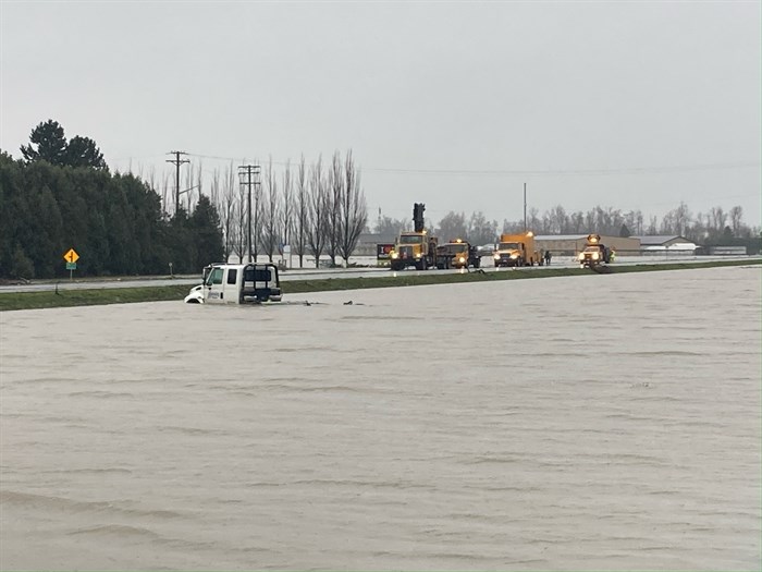 Water is still deep near Highway 1 near Abbotsford, but the road was reopened for essential travel at 2 p.m., Nov. 25.