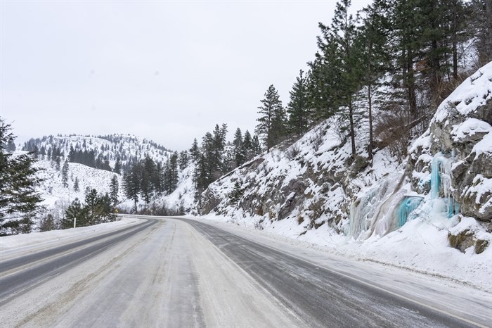 An unknown person has coloured the icicles on a rock face that formed along Highway 3A near Kaleden, something that happens every winter.