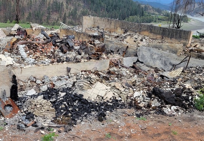 The remains of Lytton resident Denise O'Connor's house after the Lytton Creek fire destroyed the town on June 30, 2021.